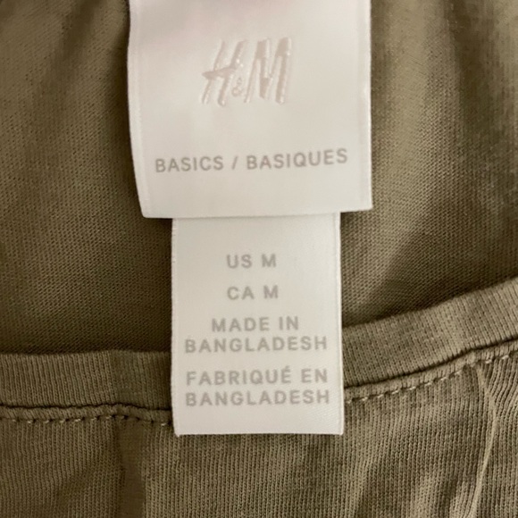 Solid green shirt
Size - M
Stainless 
Brand new, never used
Blouse and tee - Picture 3 of 3